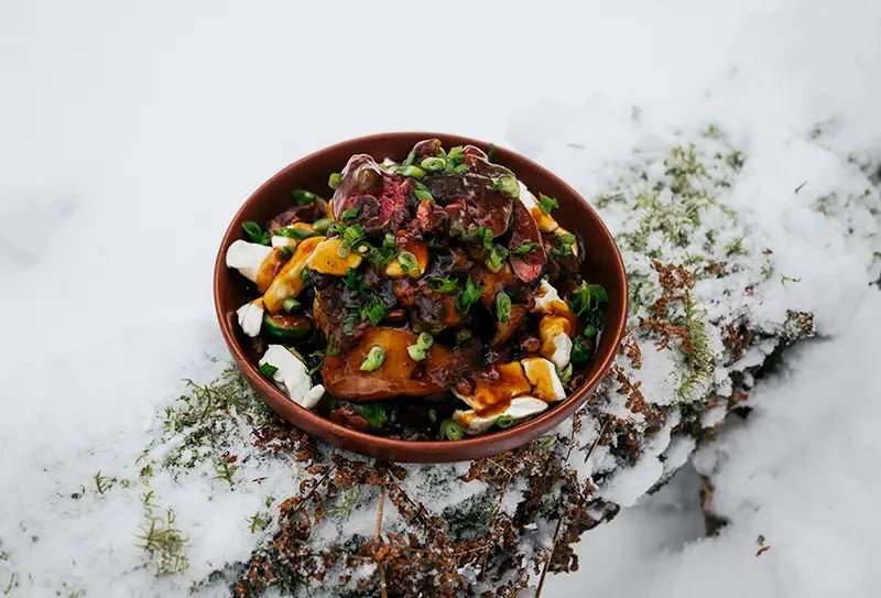 Poutine with wild duck breast, brussel sprouts, mushrooms, bacon and maple syrup pepper sauce. - Hooké